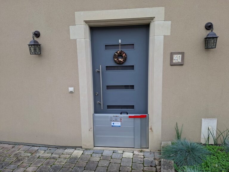 batardeau devant une porte d'entrée